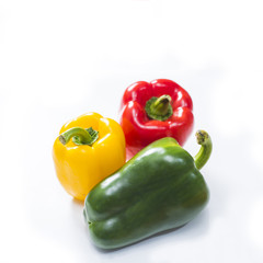three bell peppers isolated on white background