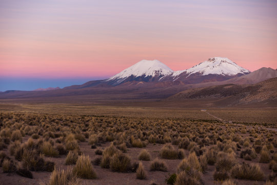 Sunset in Andes. Parinacota and Pomerade volcanos.