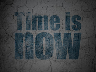 Time concept: Blue Time is Now on grunge textured concrete wall background