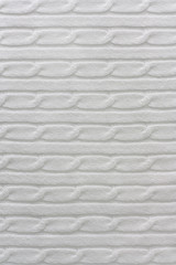 Texture of white knitted cotton fabric for background