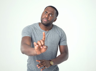 I will not. A man is an emotion of discontent, showing a sign with his finger. No, denial, stop.