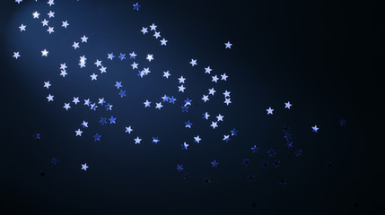 art Christmas holidays background; silver stars on blue