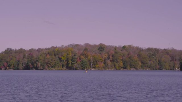 Kayaker in the far distance on Mc Kellar Lake