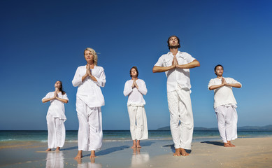 A group of people is meditating