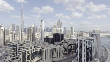 DUBAI - DECEMBER 2016: Aerial view of city skyscrapers. Dubai attracts 20 million tourists annually