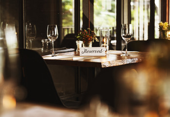 Reserved table at a restaurant - Powered by Adobe