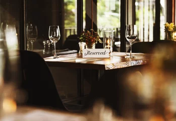 Rolgordijnen Reserved table at a restaurant © Rawpixel.com
