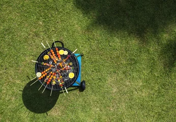 Foto auf Acrylglas Grill / Barbecue Aerial view of barbecues steaks on the charcoals grill