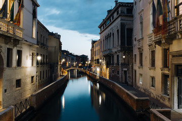 Evning, romantic venezia street with boats in octobers end 