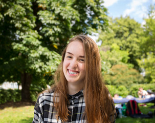 Fototapeta premium Smilling young women in the park