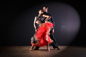 dancers in ballroom isolated on black background