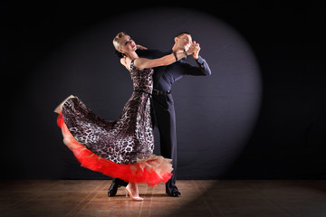 dancers in ballroom isolated on black background