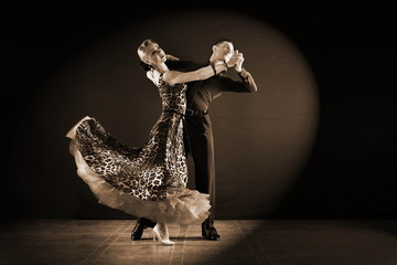 dancers in ballroom isolated on black background