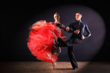 dancers in ballroom isolated on black background