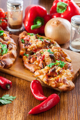 Sliced traditional Turkish pide with meat and vegetables