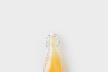 bottle of delicious apple cider isolated on white