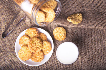 Glass of milk and cookies. Top view