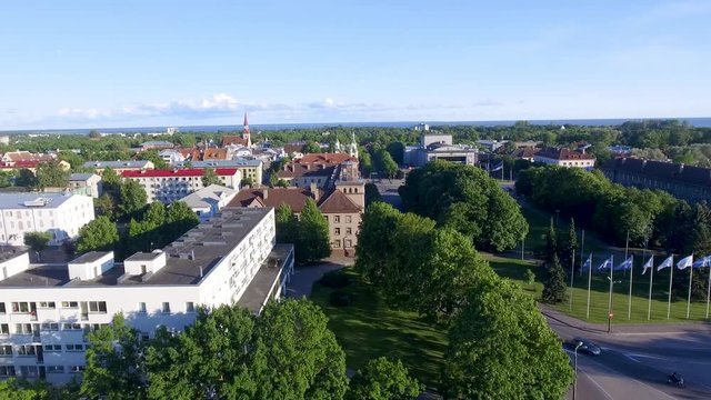 PARNU, ESTONIA - JULY 2017: Panoramic aerial view of city skyline at dusk. The city is a major attraction in Estonia 