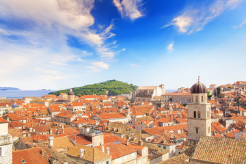 Beautiful view of the bell tower and the island Lokrum in the old town of Dubrovnik, Croatia