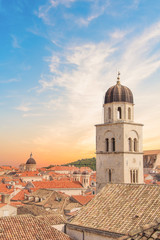 Beautiful view of the bell tower and the island Lokrum in the old town of Dubrovnik, Croatia