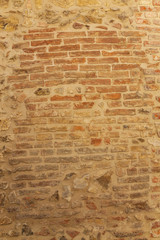 Fragment of old weathered brick wall, natural texture
