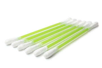 Green plastic cotton swabs