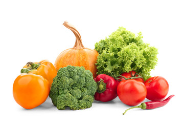 Ripe vegetables on white background