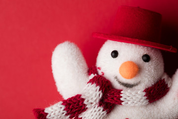 Winter festive snowman on a red background