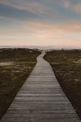 Fototapeta premium Wooden promenade in Frouxeira beach