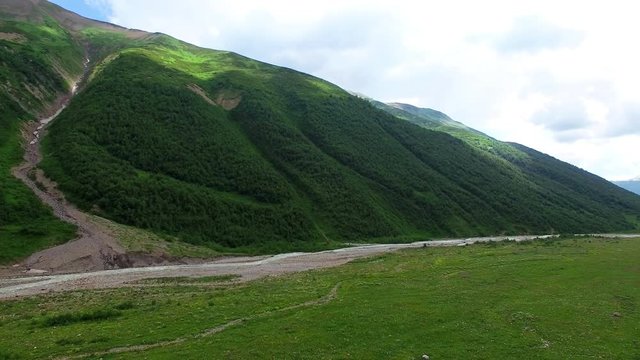 Aerial view of mountain valley 4k nature video. Caucasus, Georgia. Walking hiking trekking, hillside green hills