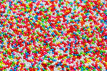 Fototapeta na wymiar close up of colorful sprinkle for topping ice cream and cake