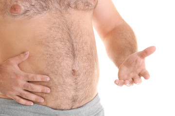 Overweight man on white background