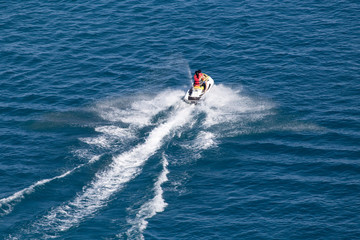 jet ski on the surface of the water at a speed of