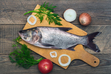 Fresh fish on a wooden table