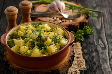 Potato salad with leek, parsley, dill and olive oil.