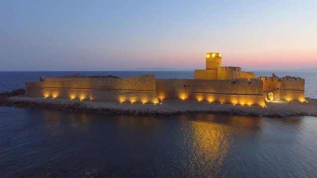 Aerial view of Fortezza Aragonese at sunset, Italy