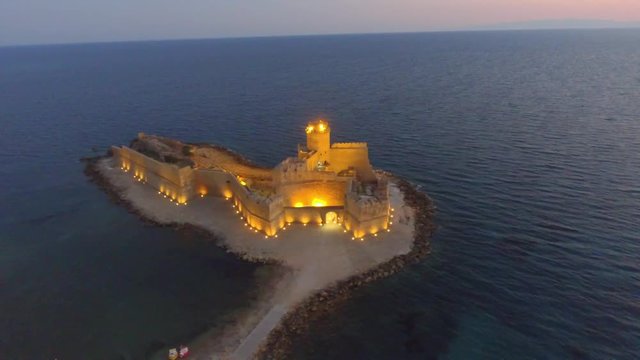 Aerial view of Fortezza Aragonese at sunset, Italy