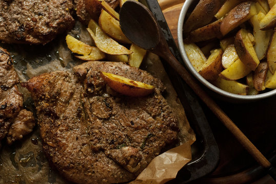 Meat steak with fry potates. Top view.