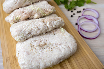 raw chicken cutlets