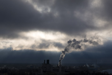 Fototapeta na wymiar the smoke from the plant in cloudy weather
