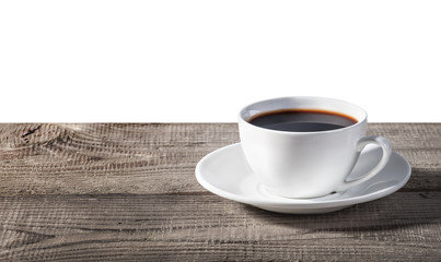 Cup of coffee on a wooden table