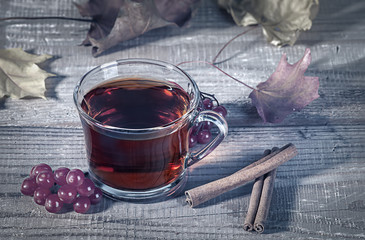 Cup of tea with viburnum and cinnamon