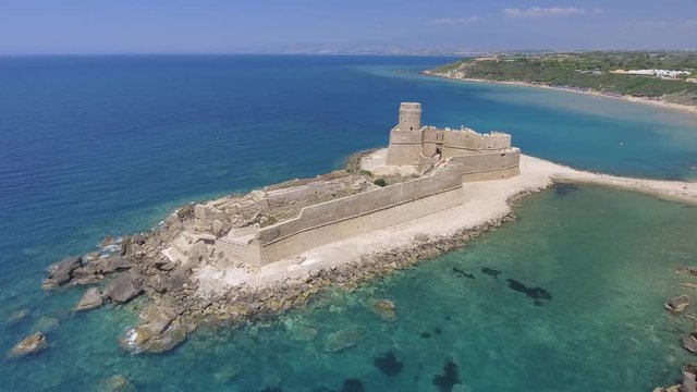 Aerial view of Fortezza Aragonese in Isola di Capo Rizzuto on a beautiful summer day, Italy