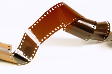 Twisted film strip on white background.