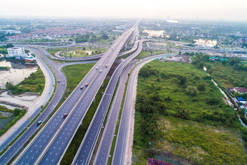 Modern traffic road way to city in morning light