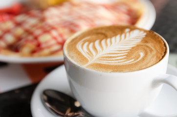 Strawberry crape cake with coffee