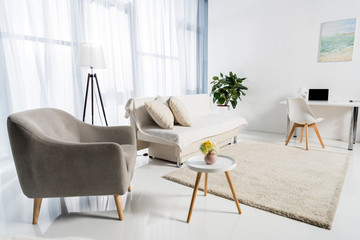 cozy living room interior decorated in pastel colors