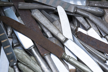Background of old dirty cutlery close-up photo