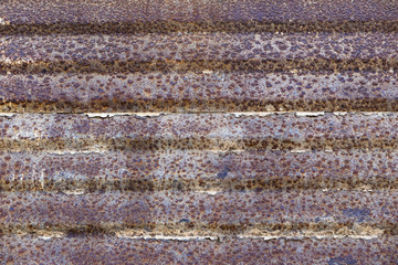 Background of rusty metal with irradiated paint