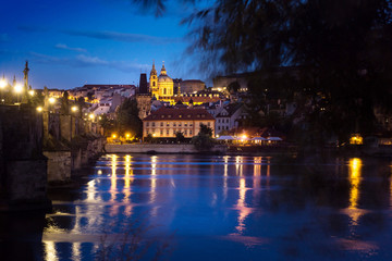 Naklejka premium Old Town ancient architecture and river pier in Prague, Czech Republic